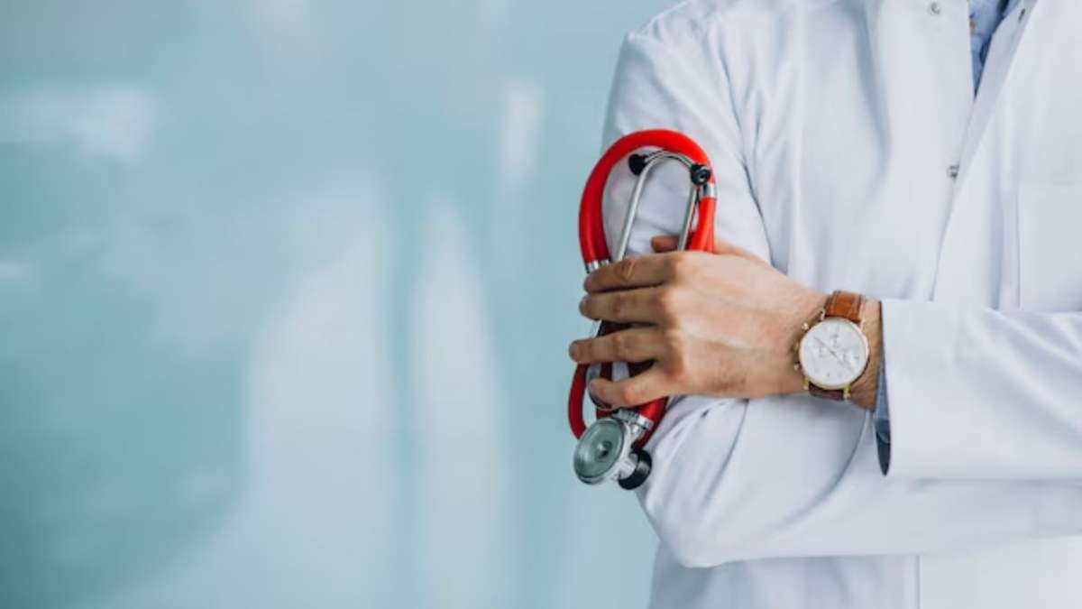 Physician holding a stethoscope